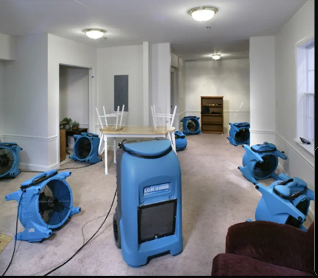 Air movers and dehumidifier setup for Water Damage Restoration in Lyndon